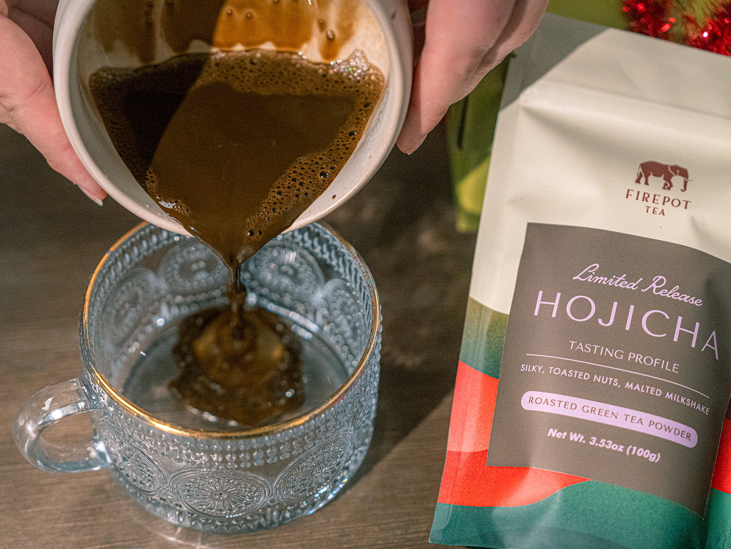 image of bag of hojicha and a mug of hojicha