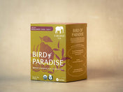 Tea box labeled 'Bird of Paradise' with green and brown design on a beige background