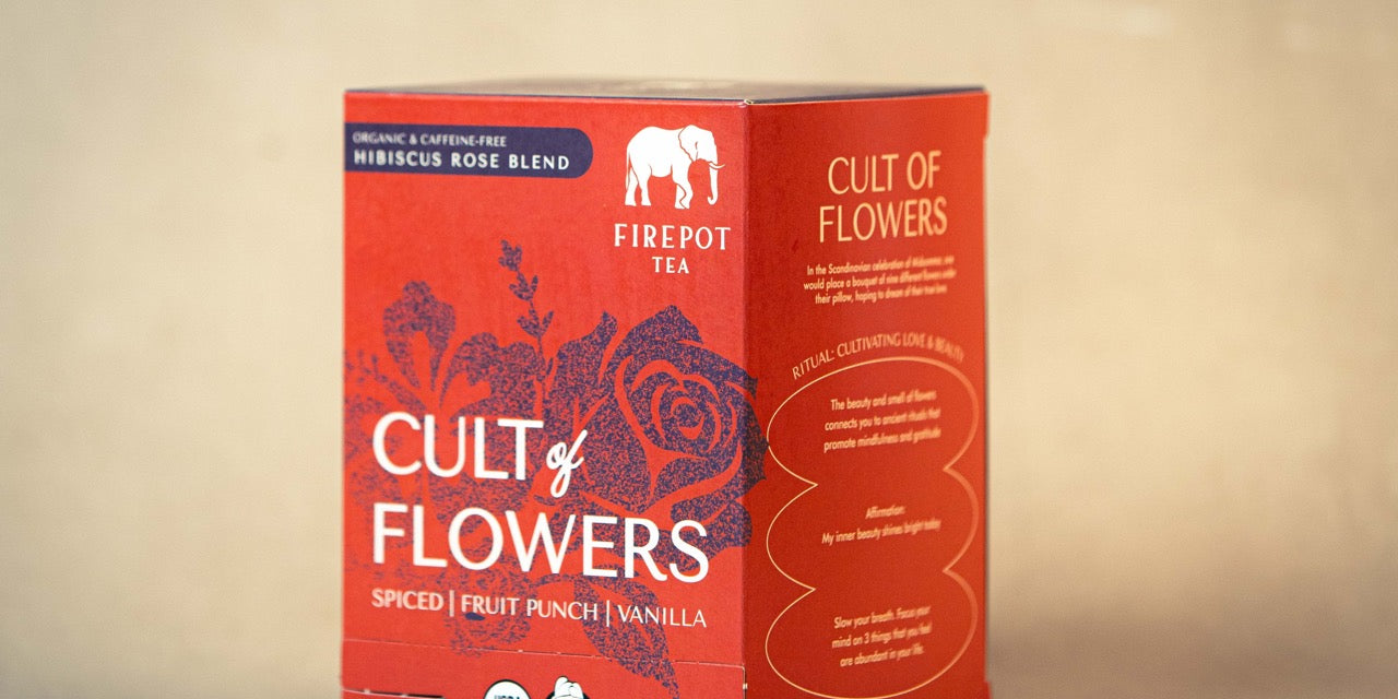 Cult of Flowers tea box on a beige background