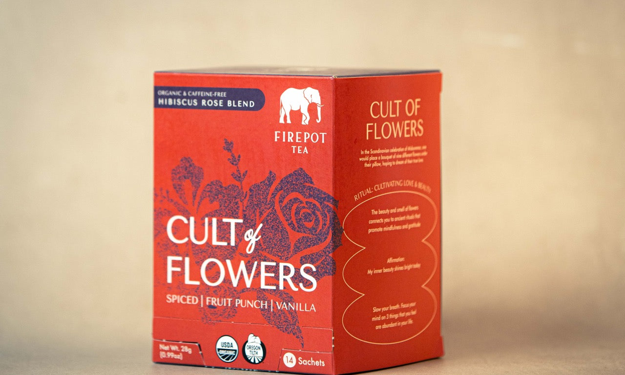 Cult of Flowers tea box on a beige background