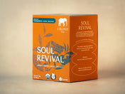 Orange box of Firepot Tea Soul Revival on a beige background
