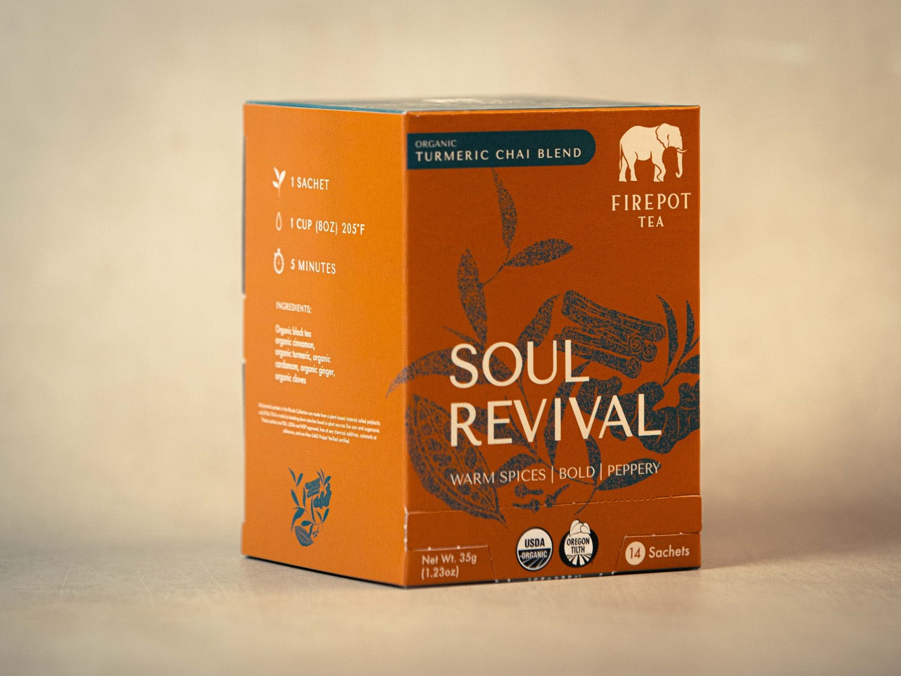 Orange box of Soul Revival tea blend with branding on a beige background