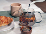 italian grey steeping in a glass on a table