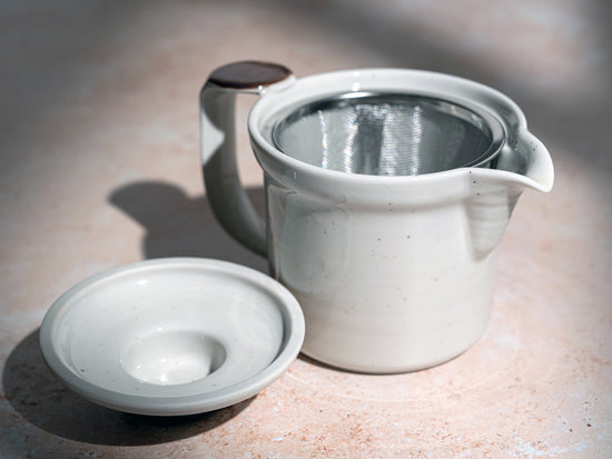 mizuki white teapot with strainer inside and lid off