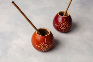 two mate gourds with bamboo straws from above